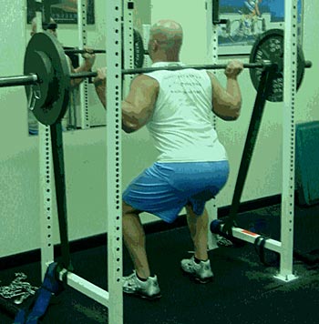 50-REP RHYTHM SQUATS 1